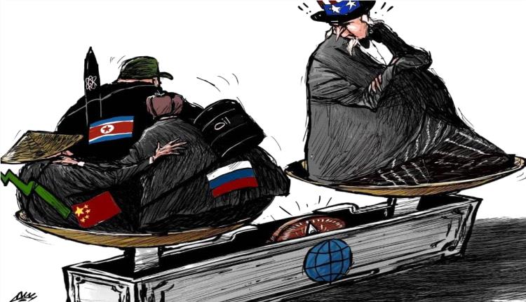 الحدث بالكاريكاتير:العالم بين كفتين